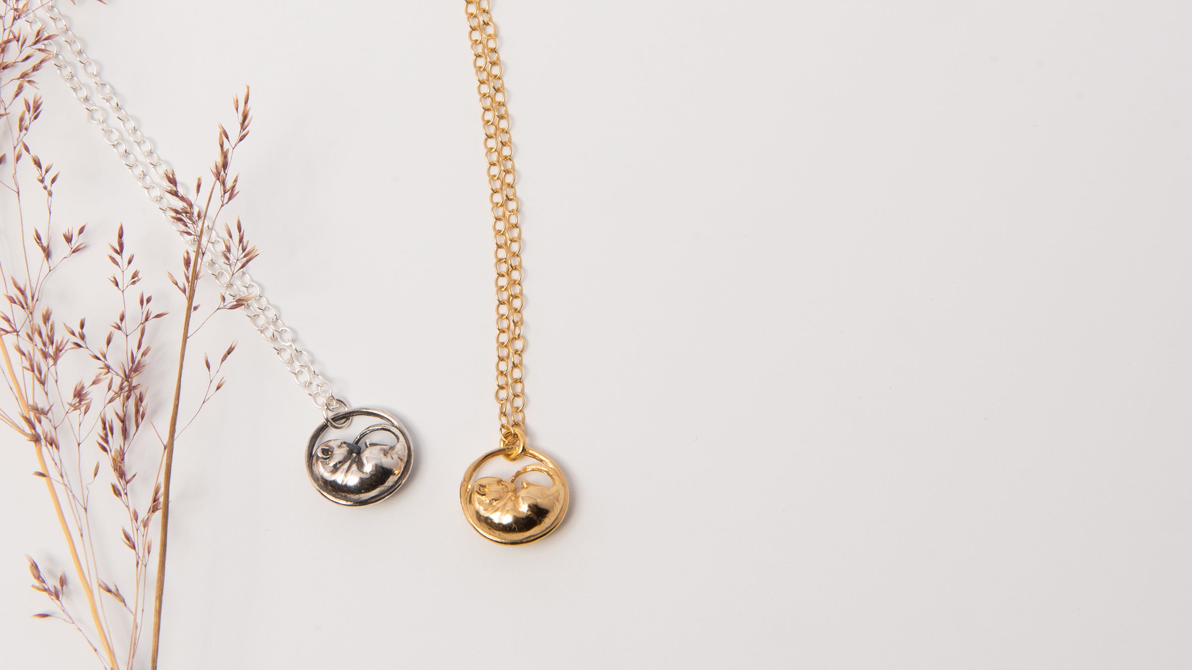 Blackbird Jewellery sleeping dormouse necklaces in sterling silver and gold vermeil