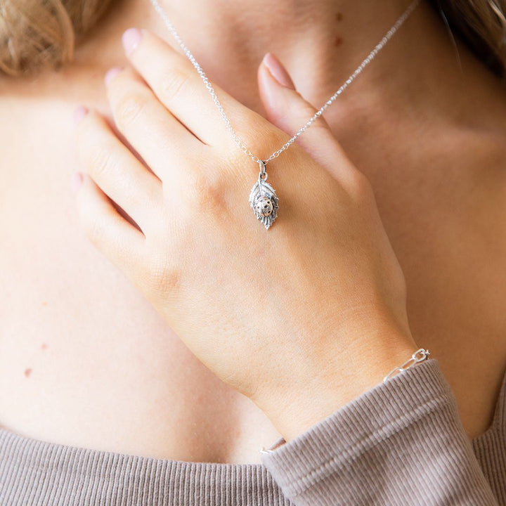 Model wearing sterling silver ladybird necklace – nostalgic handmade jewellery by Blackbird Jewellery