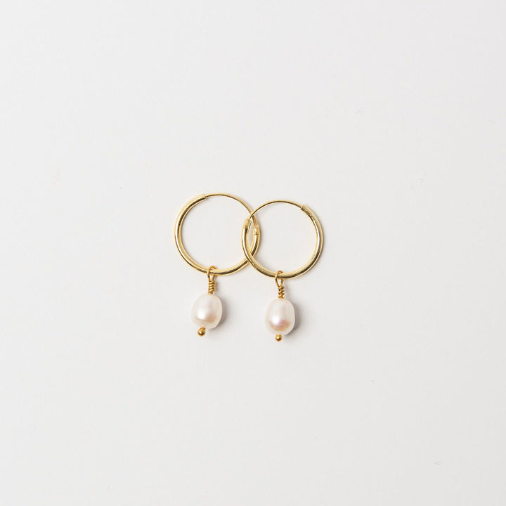18ct Gold Vermeil Pearl Drop Hoop Earrings with lustrous white pearls.