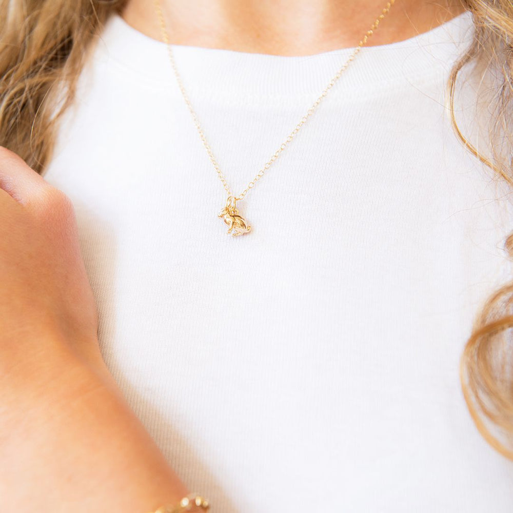 Model wearing gold vermeil rabbit necklace – nostalgic jewellery gift by Blackbird Jewellery