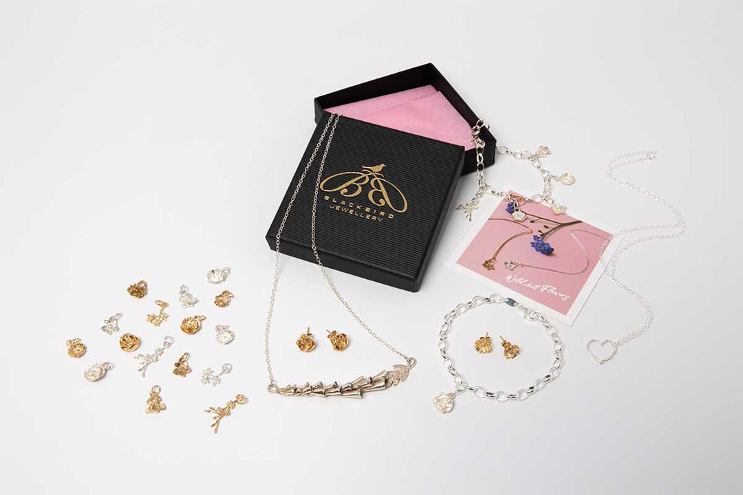 Handcrafted nature inspired jewellery by Blackbird Jewellery featuring bird and leaf designs in sterling silver.