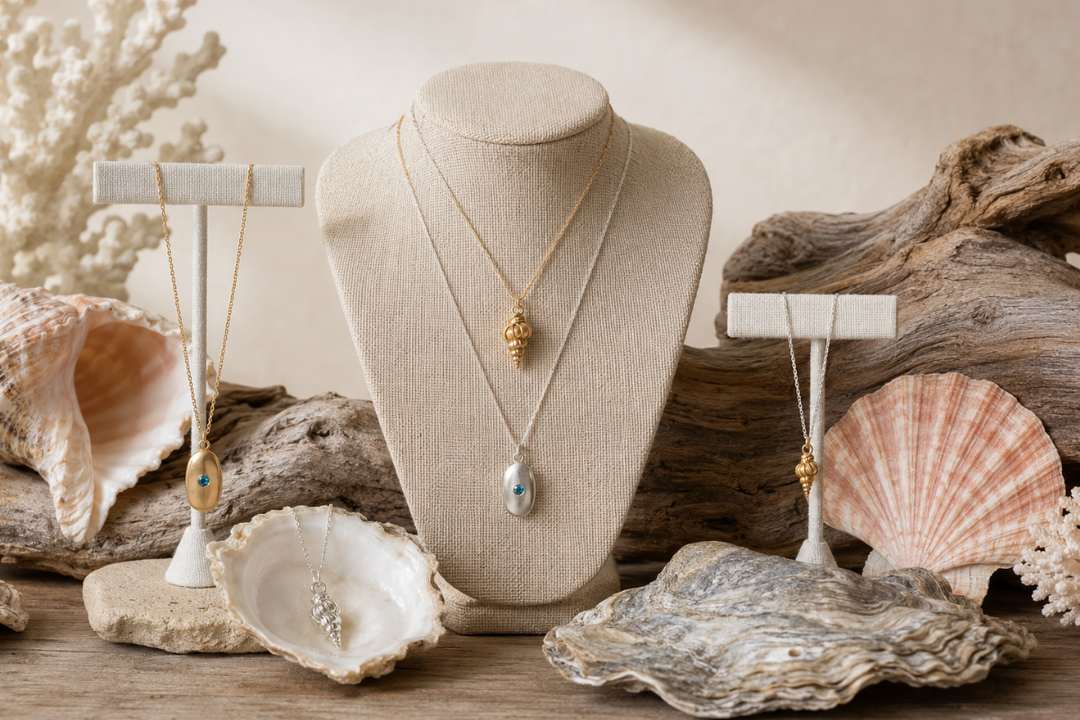 Ocean-inspired jewellery styled for summer with shell and pebble designs