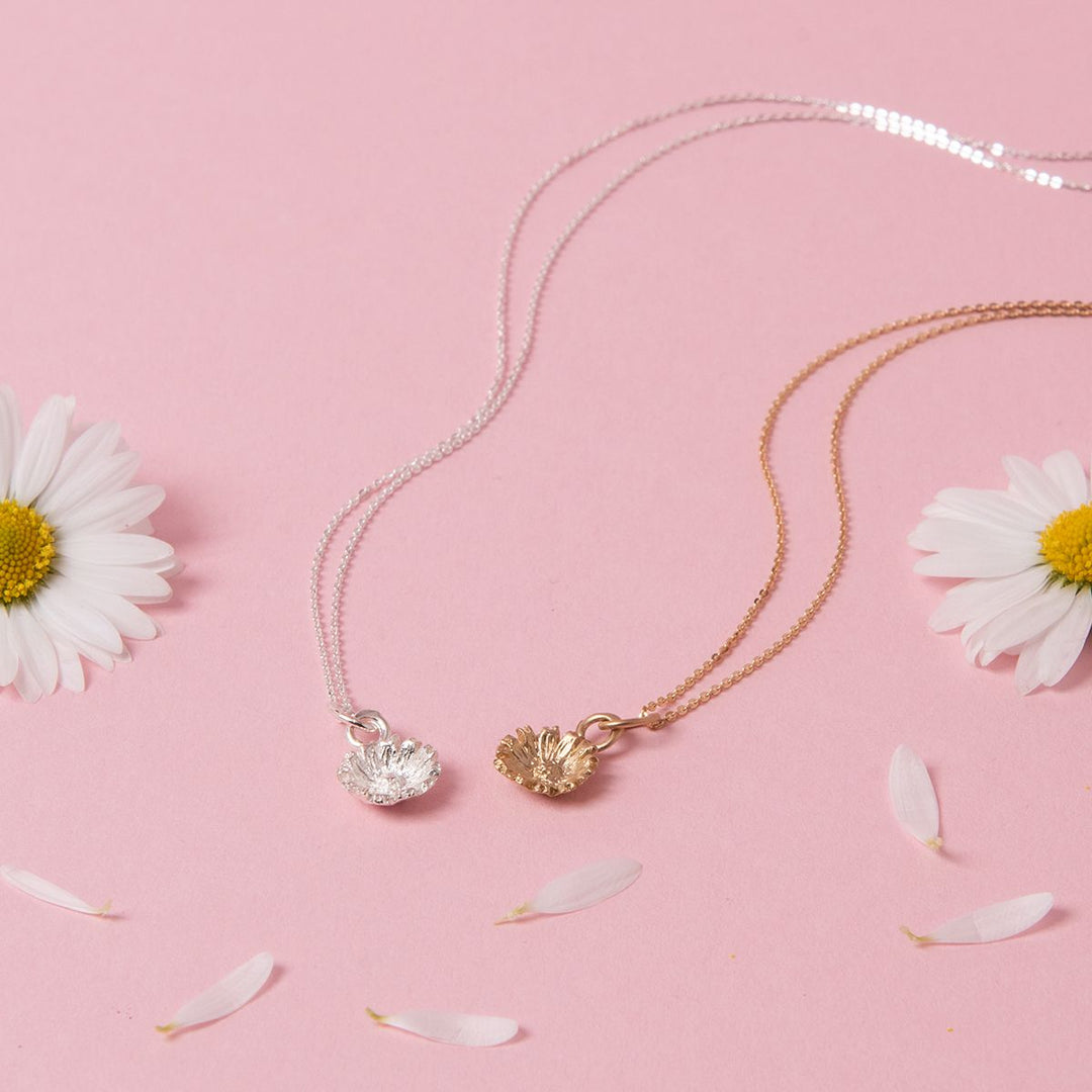 Handmade Daisy Necklaces inspired by April’s birth flower, symbolising innocence and joy.