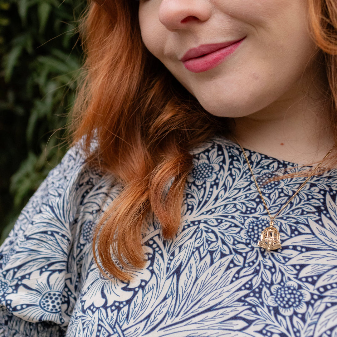 18ct Gold Vermeil Birdcage Necklace with a tiny bird inside, handcrafted in the UK by Blackbird Jewellery.