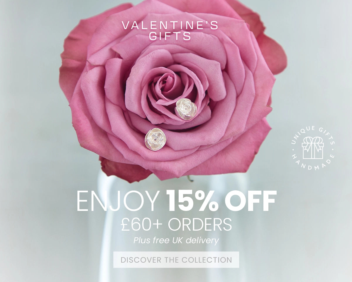 Pink rose with silver rose stud earrings promoting Blackbird Jewellery Valentine’s gifts, offering 15% off orders over £60 with free UK delivery.