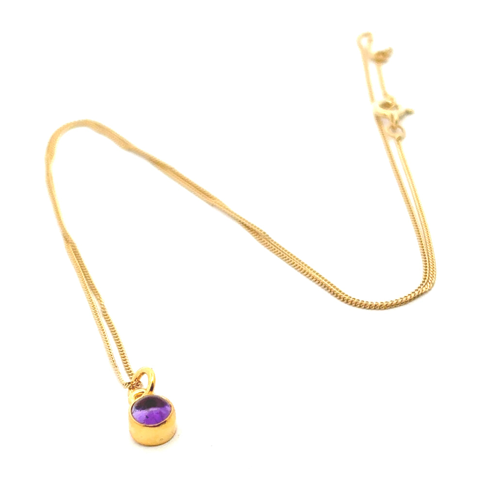 Blackbird Jewellery 18ct Gold Vermeil Amethyst Necklace with February birthstone flatlay on white background