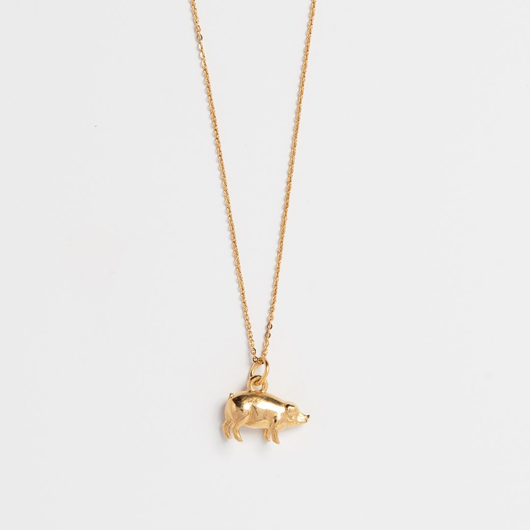Blackbird Jewellery 18ct gold vermeil lucky pig charm necklace with fine chain, handcrafted three-dimensional pig pendant symbolising prosperity and good fortune