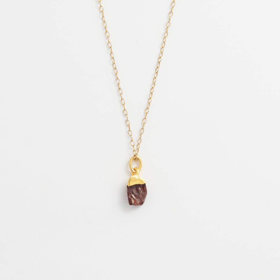 Blackbird Jewellery gold vermeil garnet raw crystal necklace with fine chain on white background