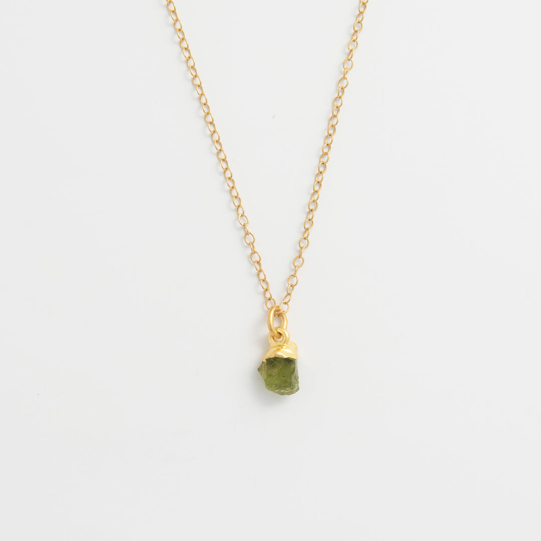 Blackbird Jewellery gold vermeil peridot raw crystal necklace with fine chain on white background