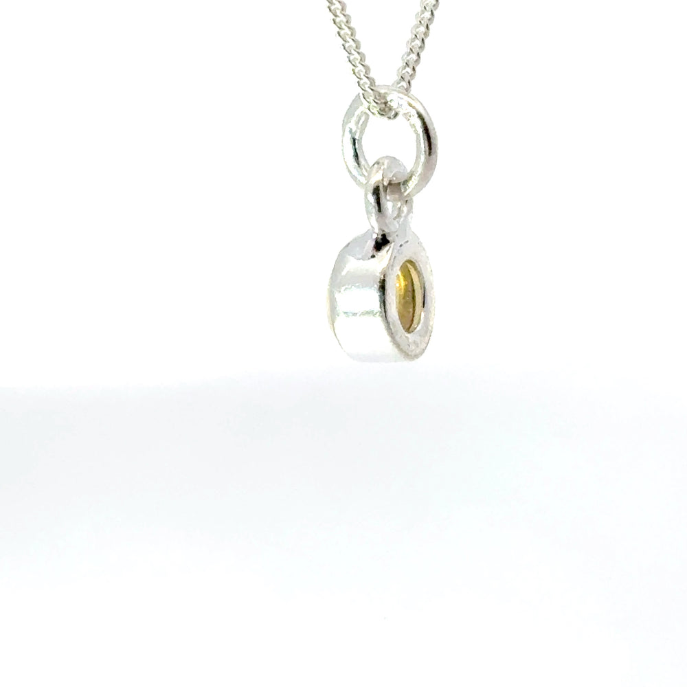 Blackbird Jewellery Sterling Silver Ethiopian Opal Necklace with October birthstone with a opal gemstone side view on white background 