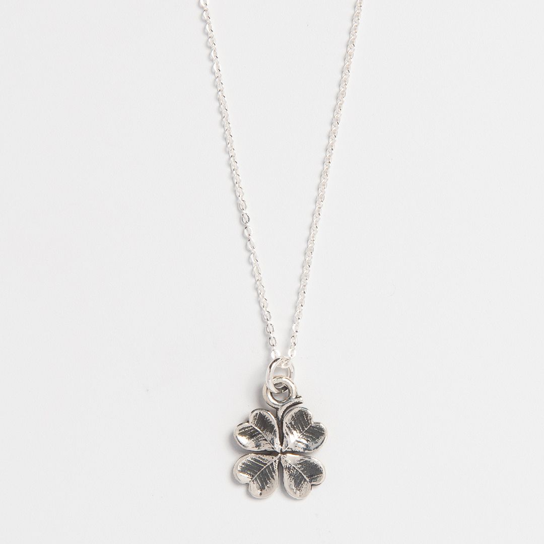 Blackbird Jewellery sterling silver four leaf clover necklace on chain, handcrafted lucky clover jewellery inspired by Irish and Celtic symbolism.
