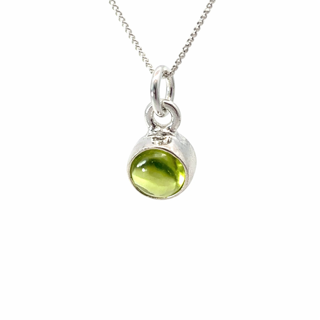 Blackbird Jewellery Sterling Silver Peridot Necklace with August birthstone with a green gemstone on white background