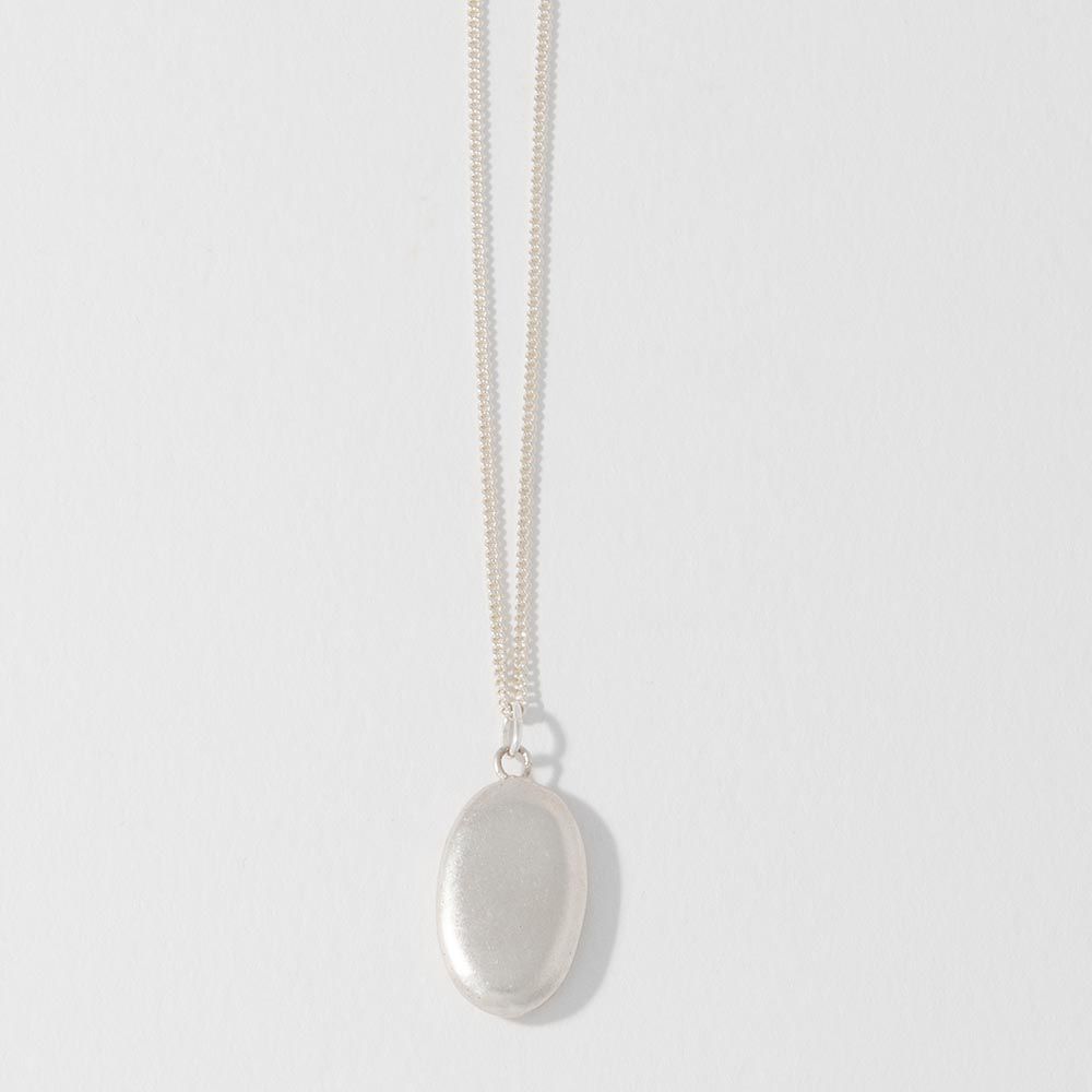 Blackbird Jewellery Sterling silver large pebble necklace cast from a real beach pebble, front view.