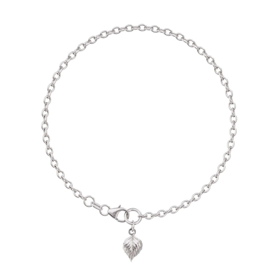 Sterling silver birch leaf bracelet on white background – handmade nature-inspired jewellery by Blackbird Jewellery