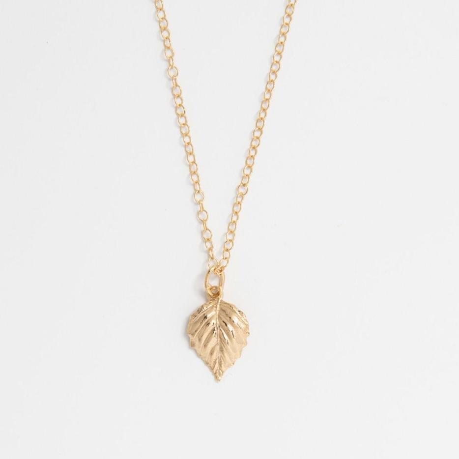 Blackbird Jewellery Gold vermeil birch leaf necklace on white background – handmade nature-inspired jewellery by Blackbird Jewellery