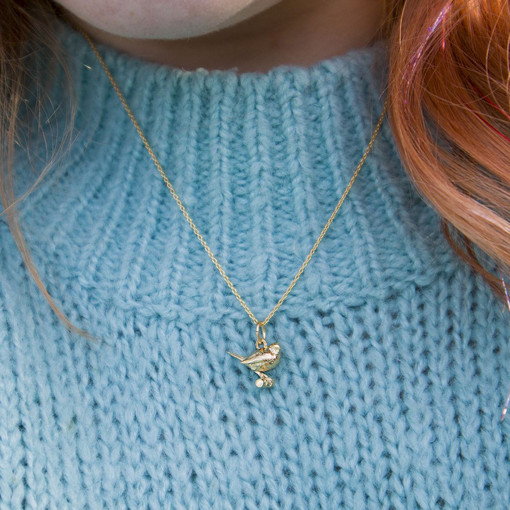 Blackbird Jewellery Model wearing gold vermeil robin charm necklace – handmade jewellery for her