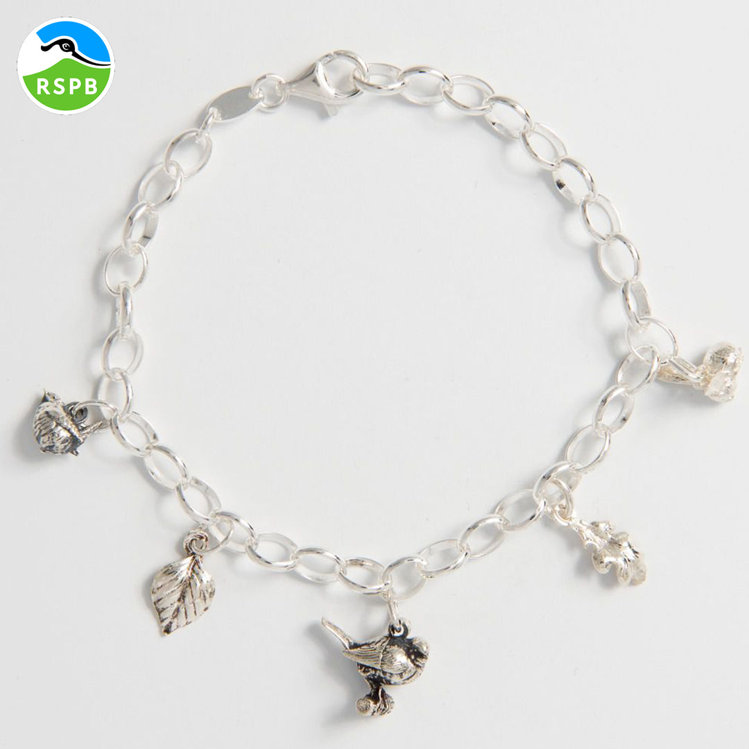 Blackbird Jewellery Sterling silver Woodland Whispers Charm Bracelet with five charms (wren, robin, bumblebee, birch leaf, oak leaf), handmade in the UK and supporting RSPB.