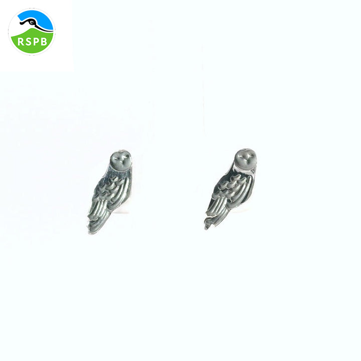 Blackbird Jewellery A pair of sterling silver earrings in the shape of barn owls.