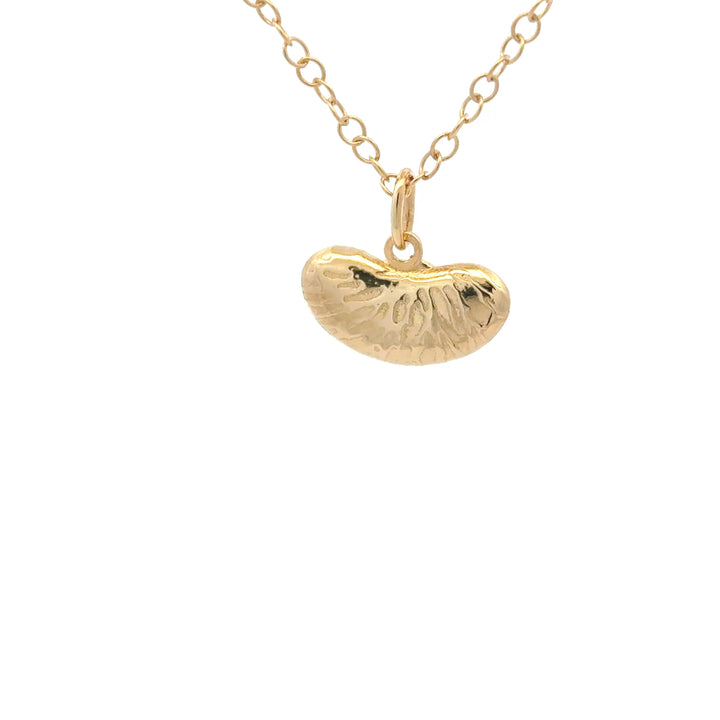 18ct gold vermeil kidney bean necklace with textured organic pendant on a white background