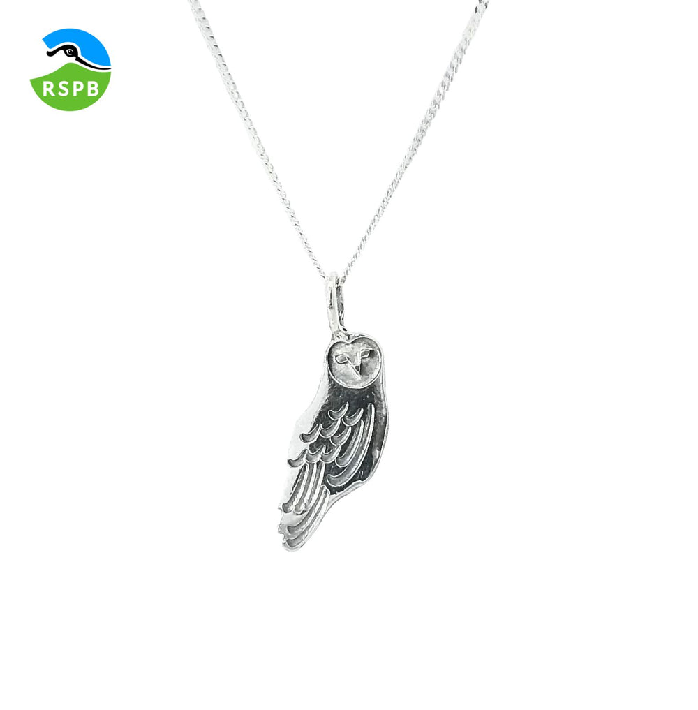 Blackbird Jewellery sterling silver barn owl necklace with a pendant featuring intricate, feather-like details, displayed against a white background with the RSPB logo.