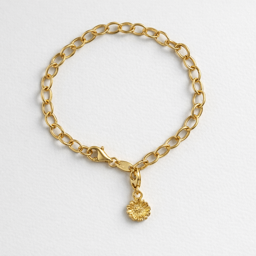 Blackbird Jewellery 18ct gold vermeil daisy clip-on charm on bracelet handmade April birth flower jewellery