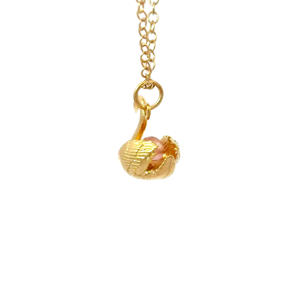 Side view of 18ct Gold Vermeil Swan Pink Quartz pendant on gold chain by Blackbird Jewellery