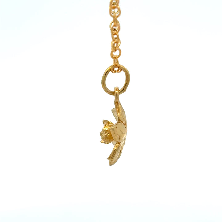 Blackbird Jewellery 18ct gold vermeil daffodil bloom necklace inspired by the March birth flower and national flower of Wales side view