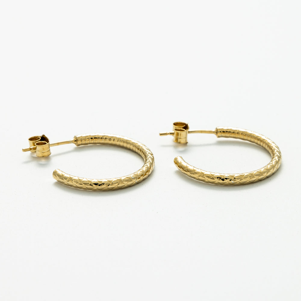 Blackbird Jewellery Close-up of Blackbird Jewellery Snakeskin Hoop Earrings in Gold Vermeil showing textured detail – Handmade in the UK