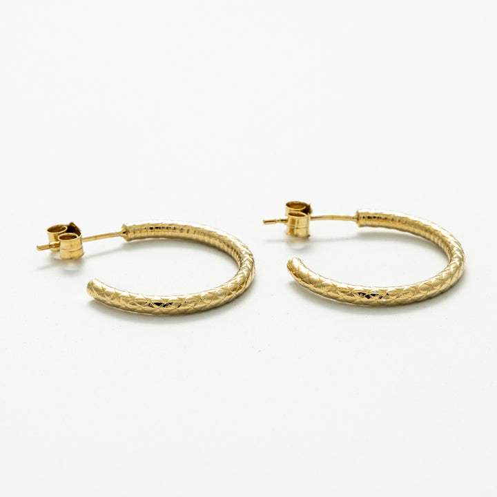 Blackbird Jewellery Close-up of Blackbird Jewellery Snakeskin Hoop Earrings in Gold Vermeil showing textured detail – Handmade in the UK