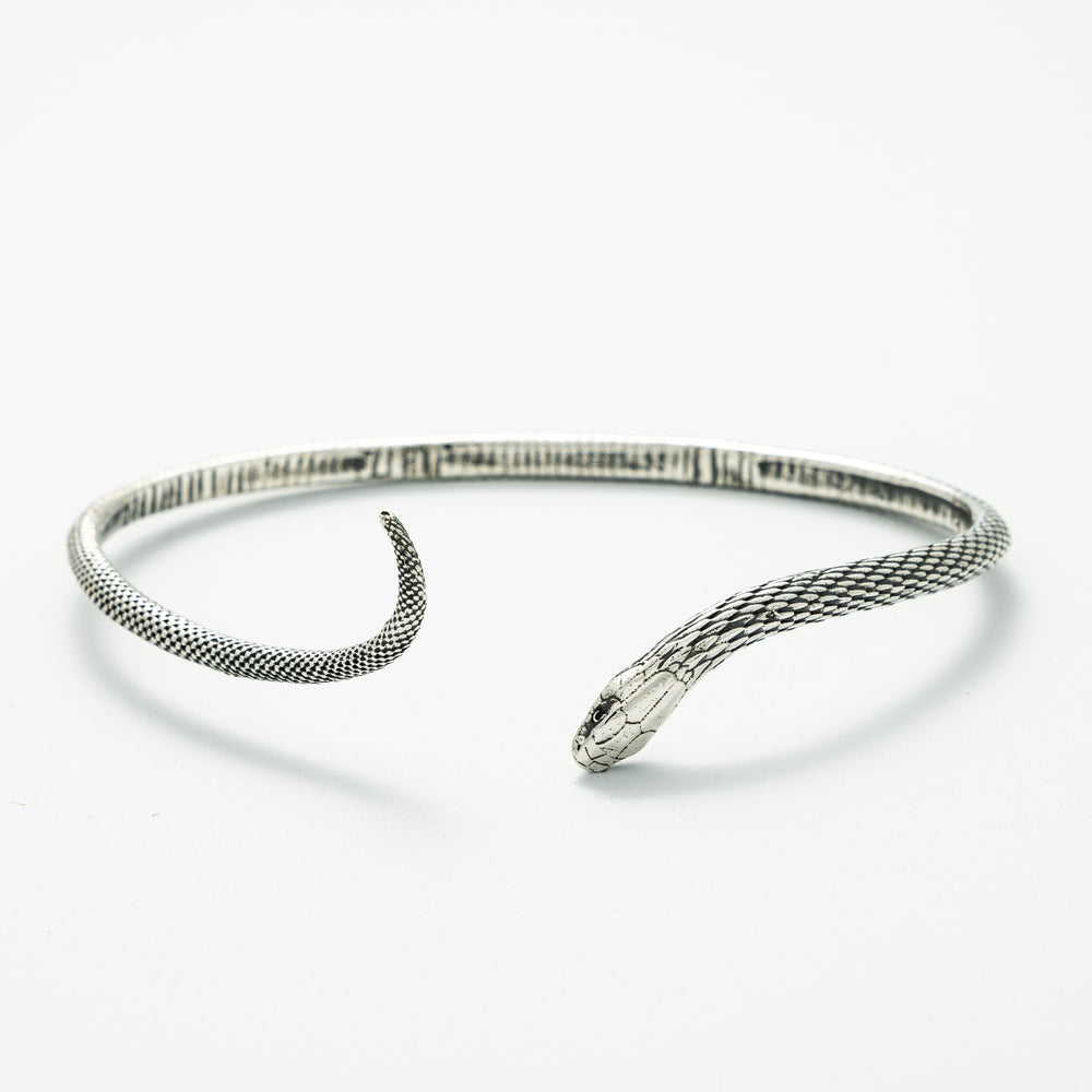 Close-up of Blackbird Jewellery Sterling Silver Snake Bracelet with textured design snakes head – Handmade in the UK