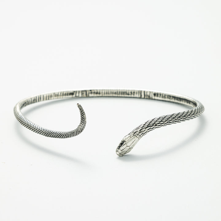 Close-up of Blackbird Jewellery Sterling Silver Snake Bracelet with textured design snakes head – Handmade in the UK