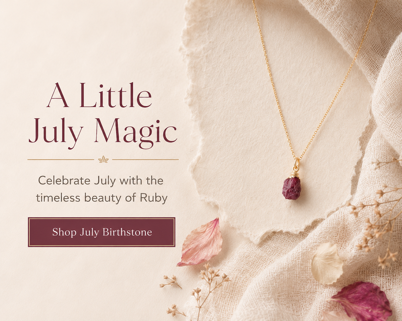 Delicate raw ruby pendant necklace in gold vermeil styled with soft cream fabric and dried petals for Blackbird Jewellery’s July birthstone collection.