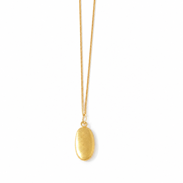18ct gold vermeil large pebble necklace on a white background by Blackbird Jewellery