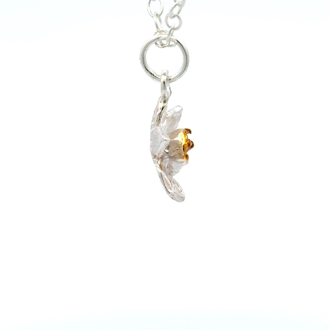Blackbird Jewellery Sterling silver daffodil bloom necklace side view detail left with gold centre inspired by the March birth flower and national flower of Wales.