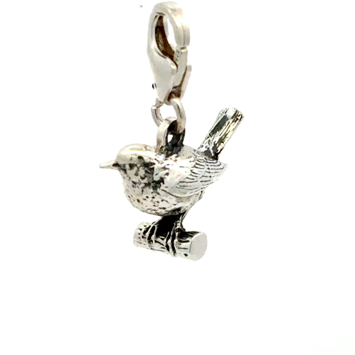 Blackbird Jewellery sterling silver mini robin charm styled on a necklace, bird jewellery gift