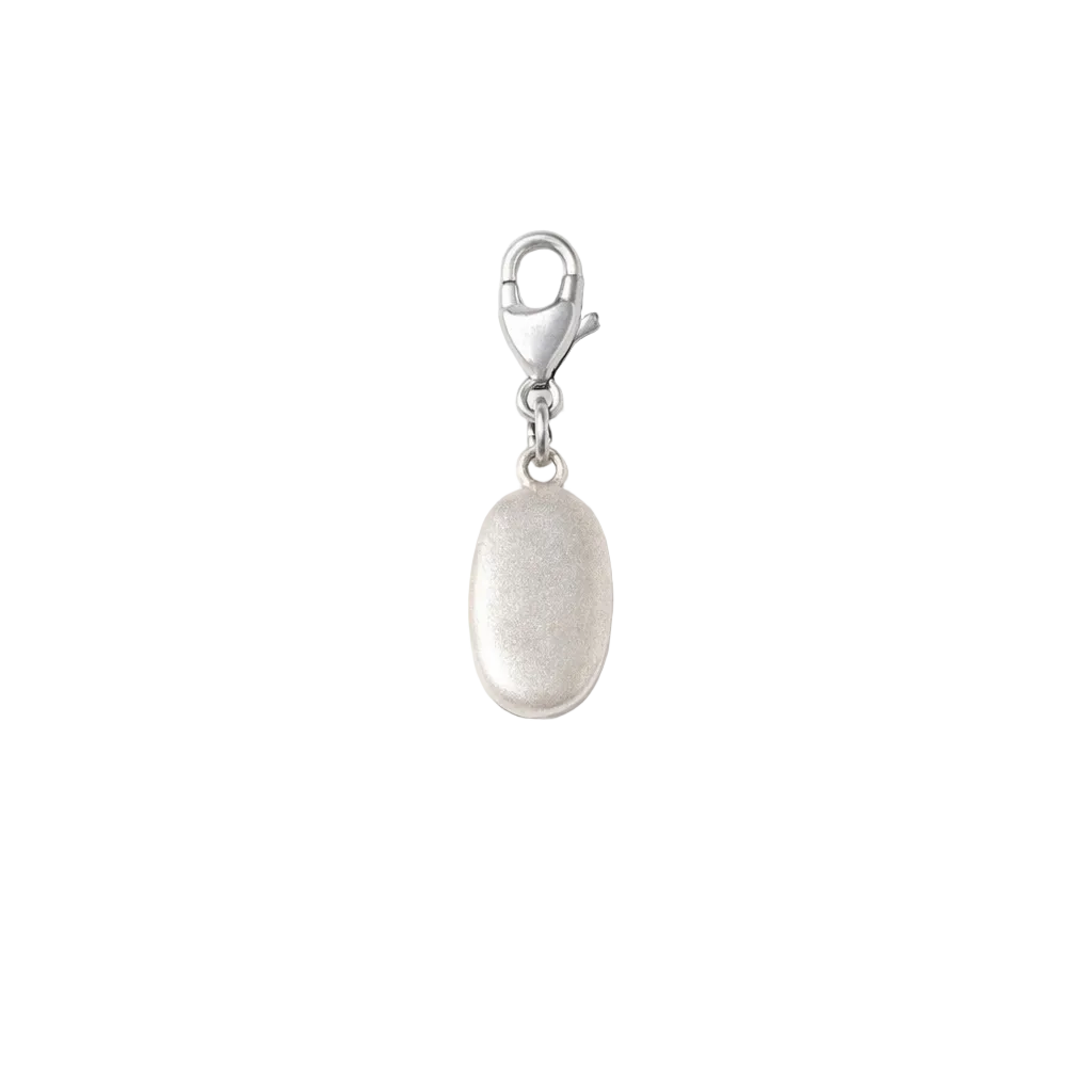Sterling silver medium pebble clip-on charm by Blackbird Jewellery inspired by a real East Sussex beach pebble, coastal jewellery gift for necklaces or charm bracelets.
