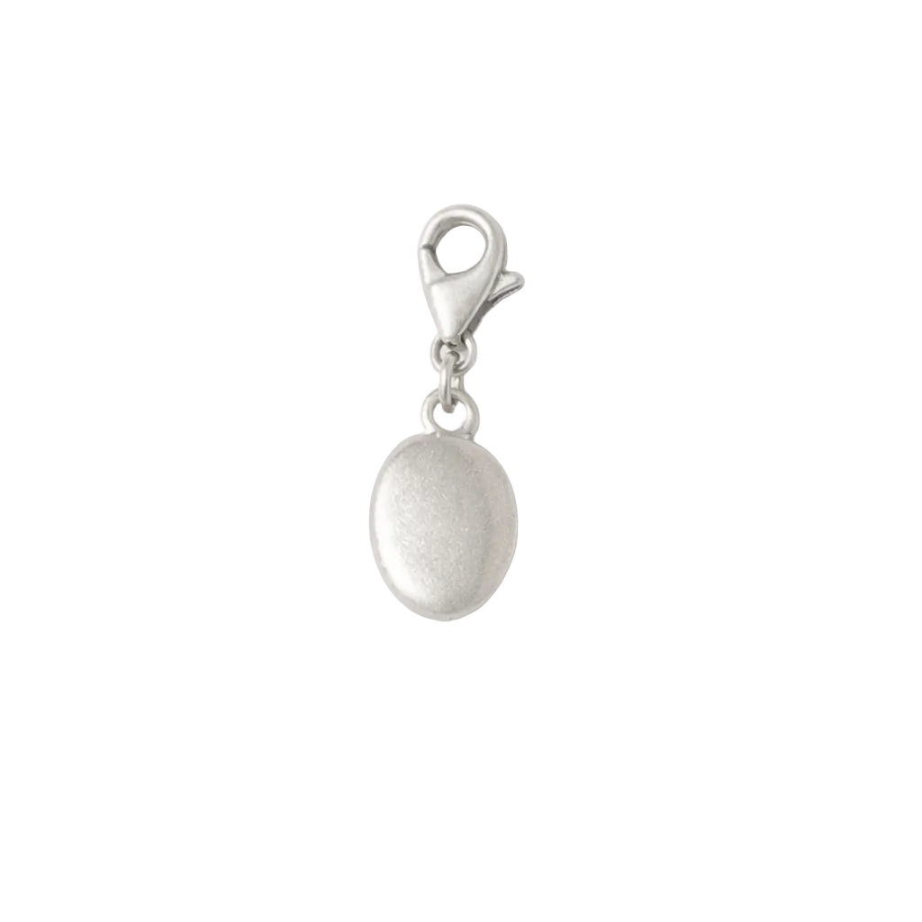 Blackbird Jewellery sterling silver small pebble charm with lobster clasp on a soft neutral background