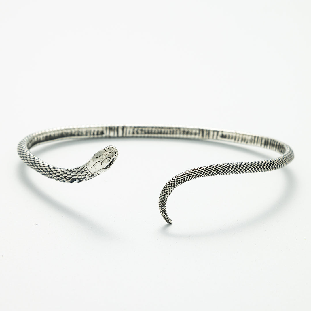 Blackbird Jewellery Sterling Silver Snake Bracelet in recycled sterling silver, designed with intricate snake-scale textures and a coiled shape for an elegant and symbolic look.