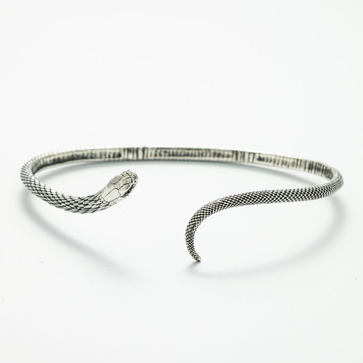 Blackbird Jewellery Sterling Silver Snake Bracelet in recycled sterling silver, designed with intricate snake-scale textures and a coiled shape for an elegant and symbolic look.