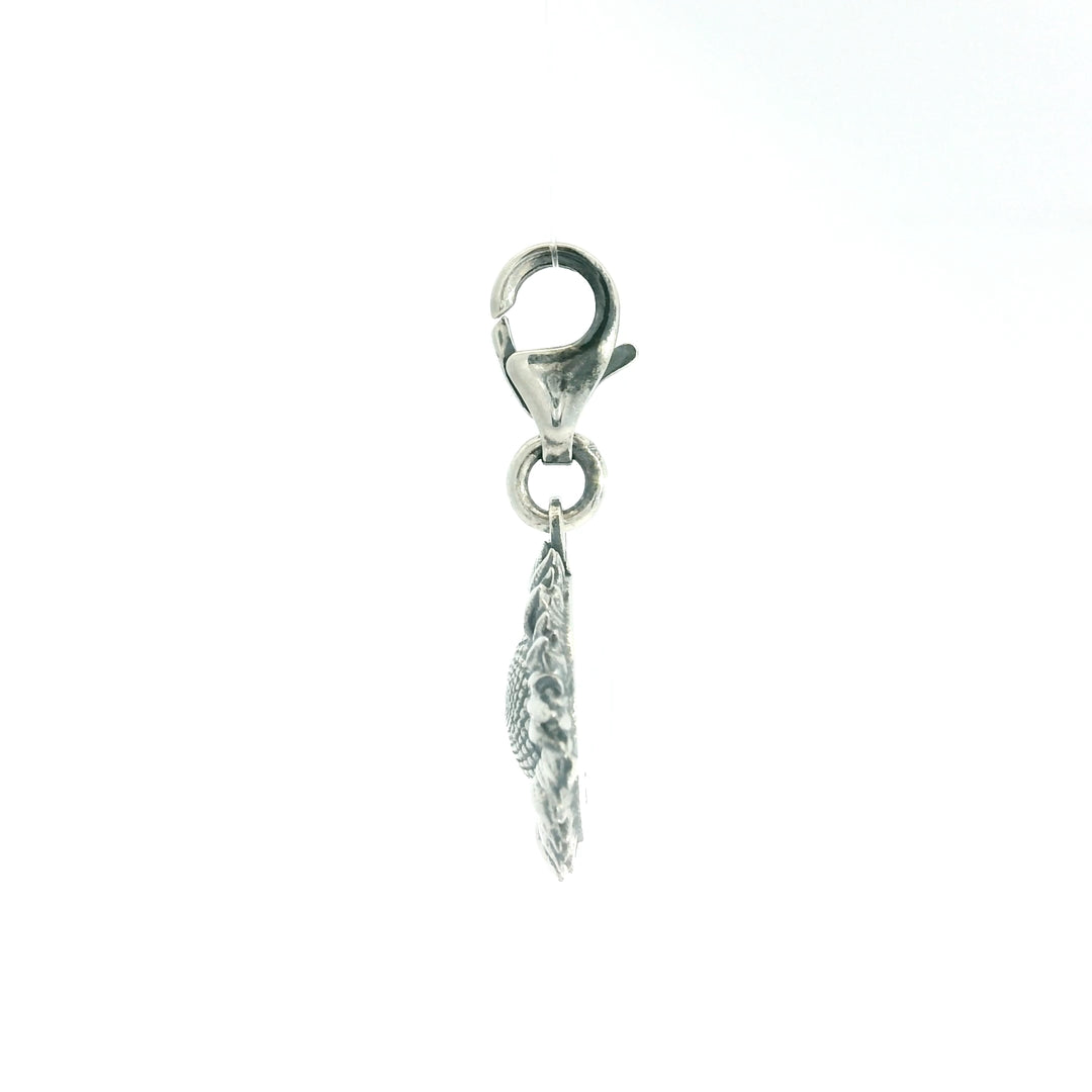 Close-up of Blackbird Jewellery recycled sterling silver sunflower charm showing clasp and petal detail from the side