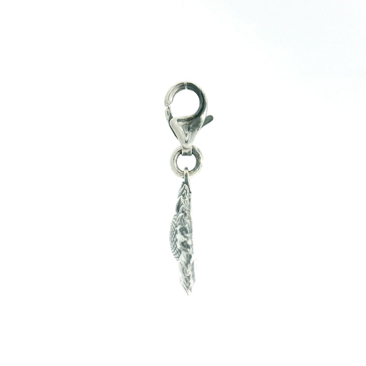 Close-up of Blackbird Jewellery recycled sterling silver sunflower charm showing clasp and petal detail from the side