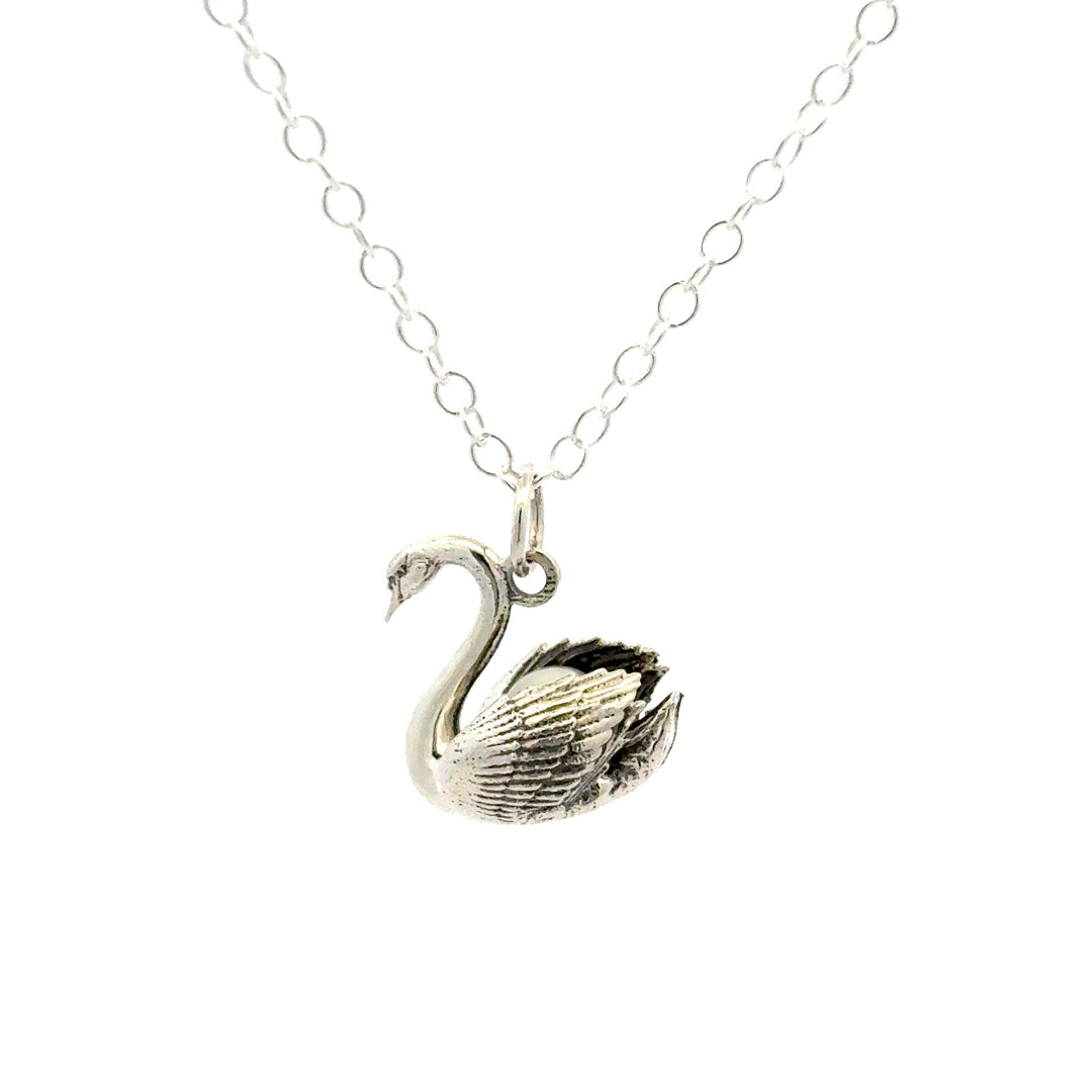 Sterling silver swan with pearl necklace side view on fine chain