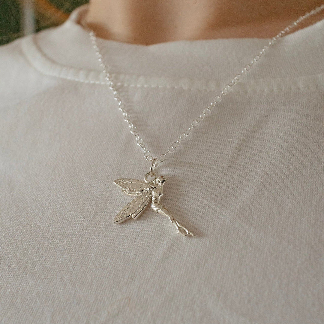 blackbird-jewellery-sterling-silver-tinker-bell-necklace-model-wearing on a white t-shirt