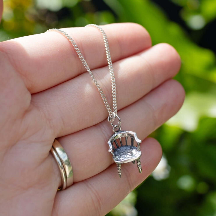 Blackbird Jewellery Close-up of handcrafted sterling silver chair necklace pendant