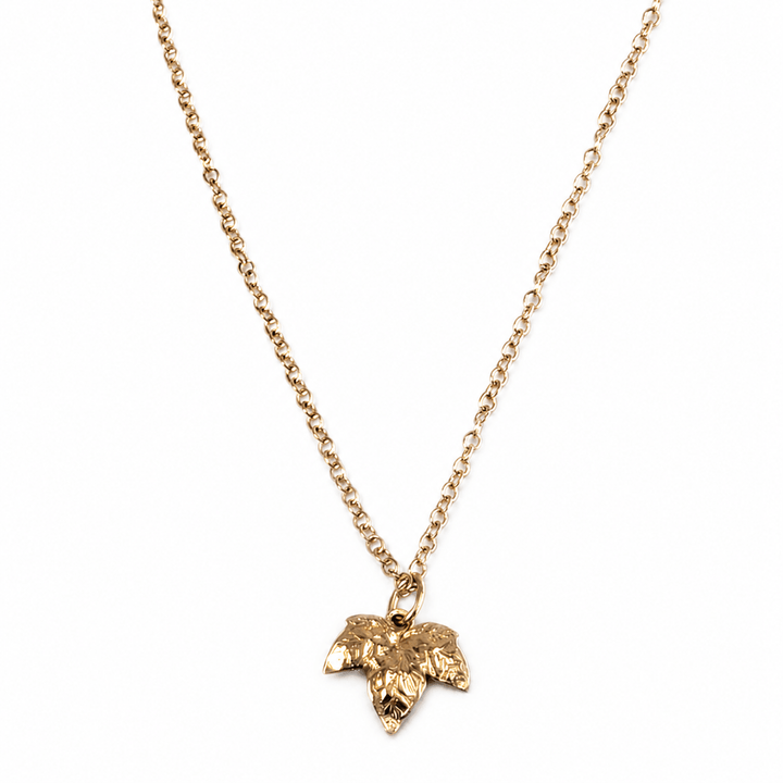 Handmade 18ct gold vermeil ivy leaf necklace by Blackbird Jewellery on a white background