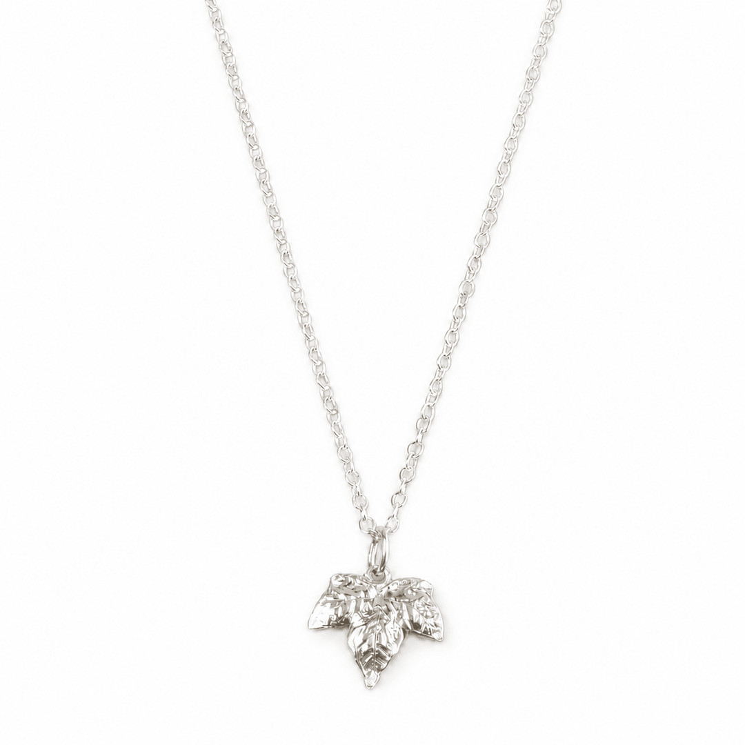 Handmade sterling silver ivy leaf necklace by Blackbird Jewellery on a white background