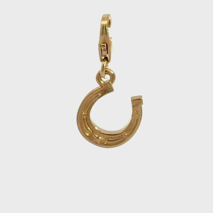 18ct gold vermeil lucky  horseshoe clip-on charm showing charm movement and detail