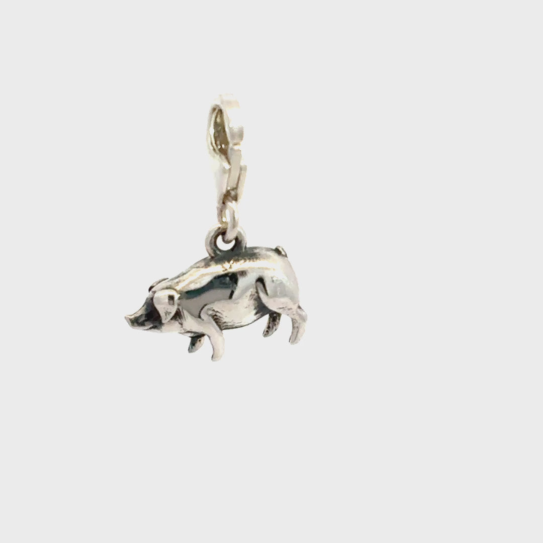 Blackbird Jewellery Sterling silver lucky pig clip-on charm with lobster clasp, handcrafted three-dimensional pig charm symbolising prosperity and good fortune turnaround video