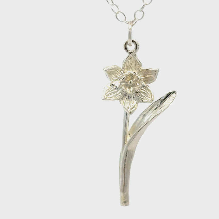 Blackbird Jewellery sterling silver daffodil flower necklace with curved stem detail.