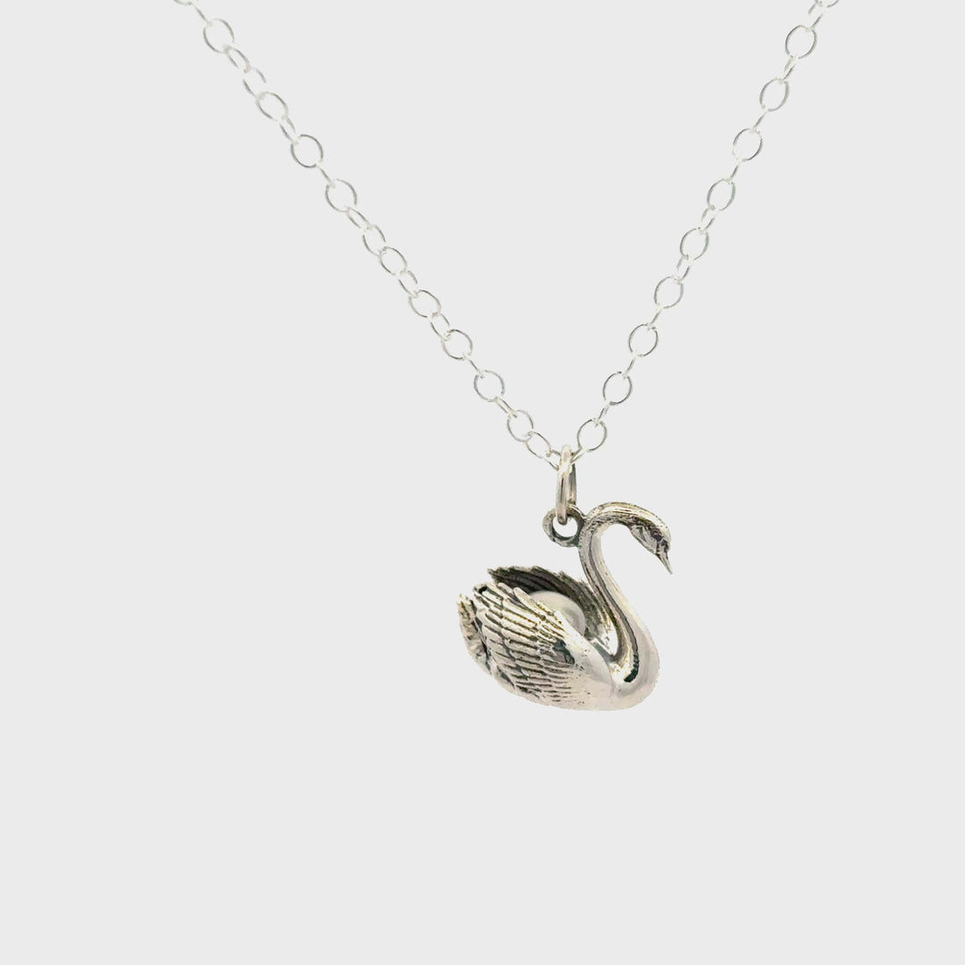 Blackbird Jewellery Sterling silver swan with pearl necklace shown in motion 